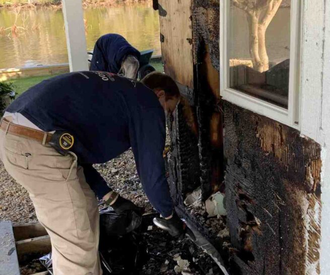 Clean up of charred building materials to begin board up of exterior wall