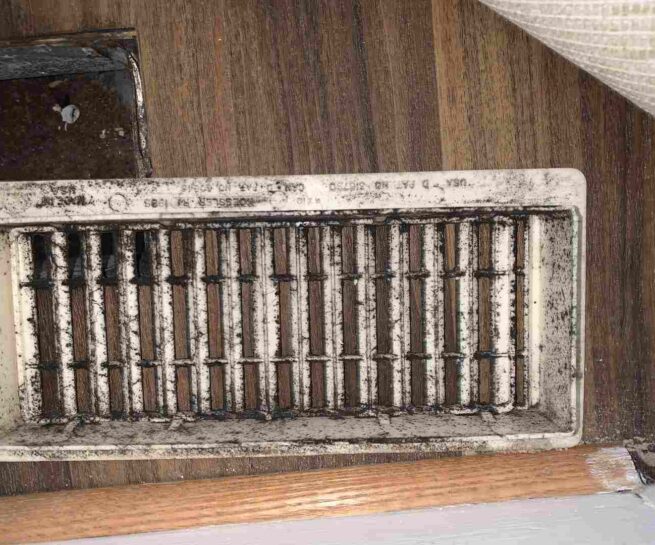 floor vents are dirty with rust, mold, and dirt