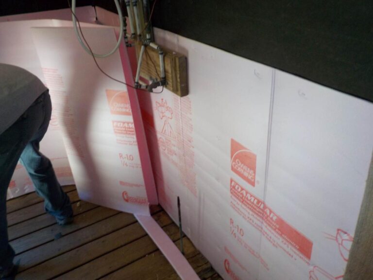 installing fiber board insulation for exterior walls