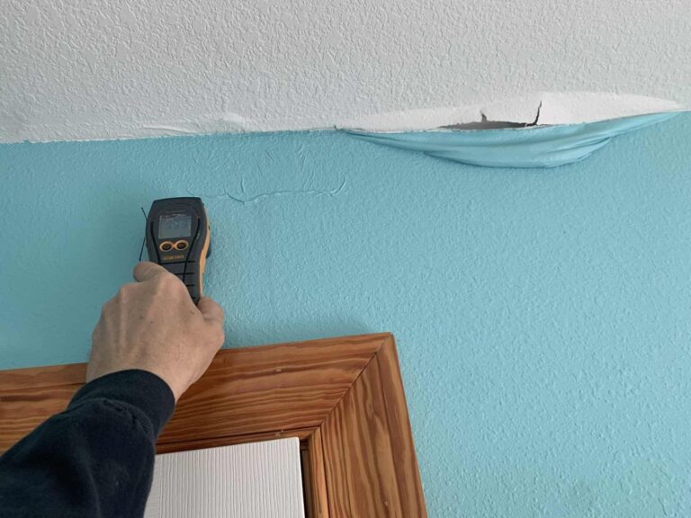 taking initial moisture readings; drywall seams were coming unglued