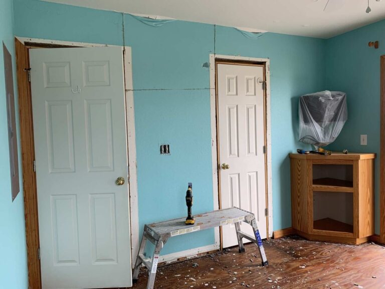 flooring removed, drywall about to come down on walls and ceilings