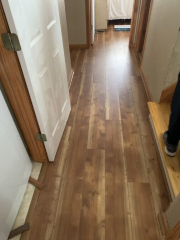 Hall vinyl flooring dried and replaced with new planks
