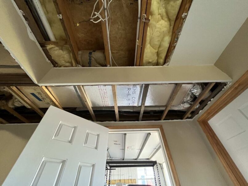 Wet drywall removed to begin drying structure