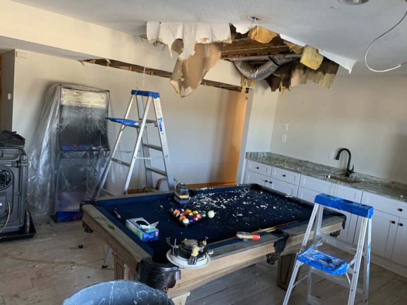 Ceiling collapsed over pool table BEFORE