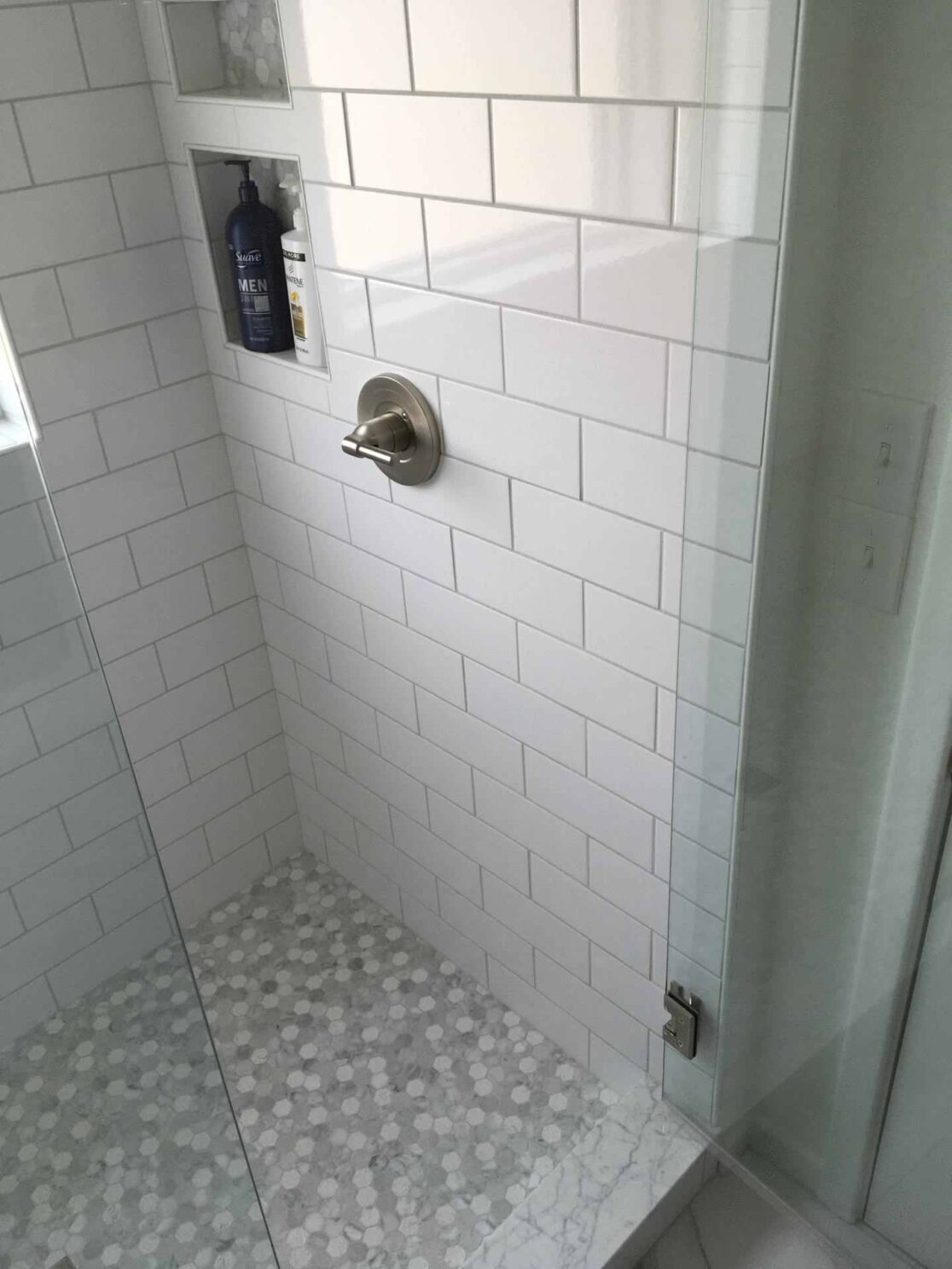 Tile shower with glass doors