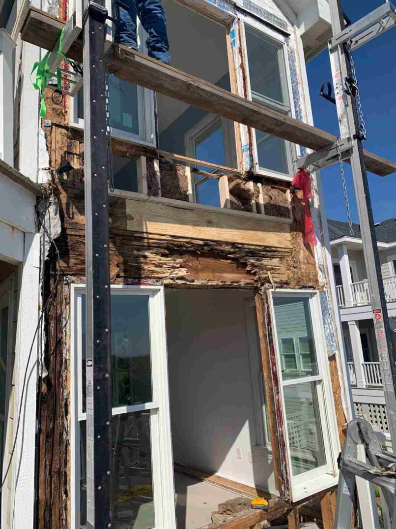 Before - Leaking windows rotted the east wall framing seen here