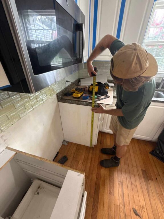 crew preps for flooring removal